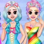 세 명의 소녀가 유니콘 및 무지개 테마의 옷을 입고 재미있는 액세서리와 함께 포즈를 취하고 있다