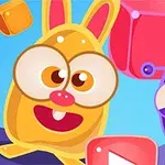 화려한 색상의 귀여운 토끼 모양과 외계 생명체 캐릭터가 다양한 색상의 큐브와 함께 등장합니다