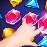 다양한 색상의 보석들 위로 손가락이 향하고 있는 모습