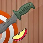 과녁에 사과가 놓여 있고, 중앙에 칼이 꽂혀 있는 모습입니다