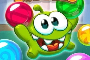 녹색의 귀여운 외계 생명체가 다양한 색상의 공들 사이에서 웃고 있는 모습